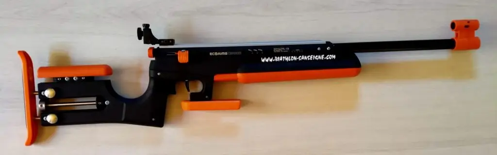 Carabine optique de biathlon orange et noire avec dioptre, viseur, chargeur et réglages